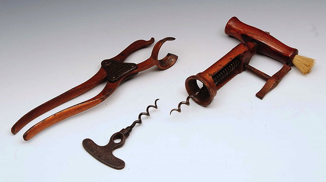 Appraisal: A LUND PATENT BRONZE PAINTED LEVER ACTION CORKSCREW and a