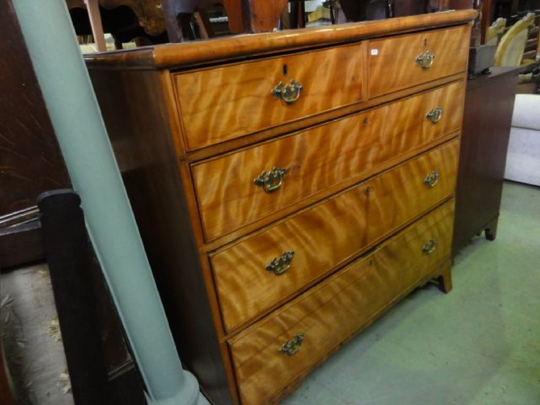 Appraisal: A th century satin walnut bedroom chest of three long