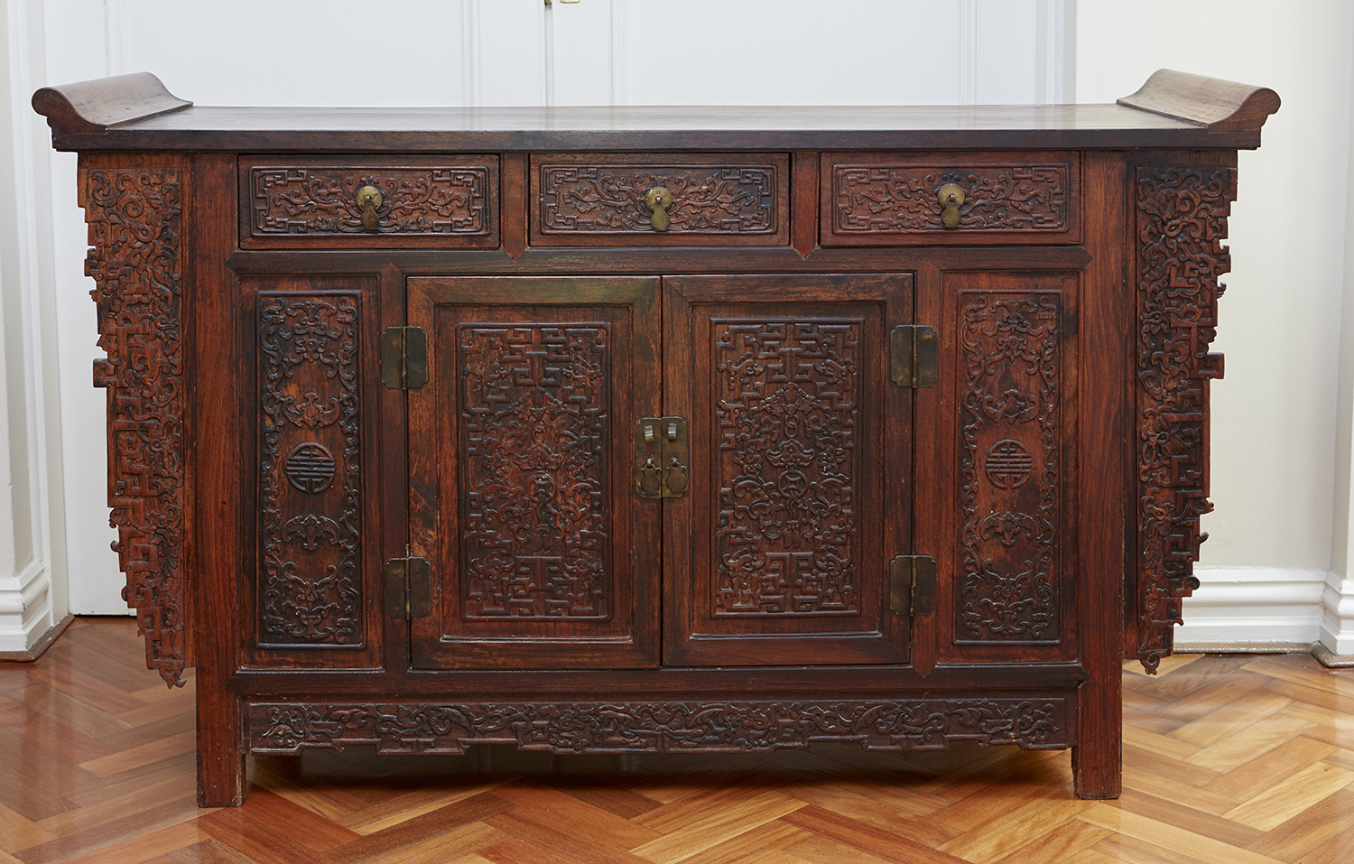 Appraisal: A CHINESE ELM WOOD ALTER CABINET Of pegged construction the