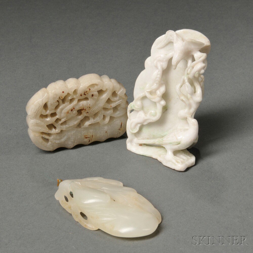 Appraisal: Three Hardstone Carvings China two pendants and a carving of