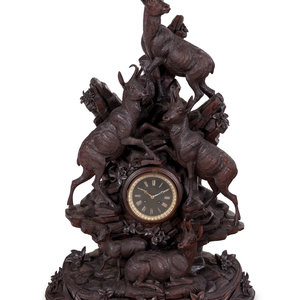 Appraisal: A Black Forest Carved Mantel Clock th Century Height x