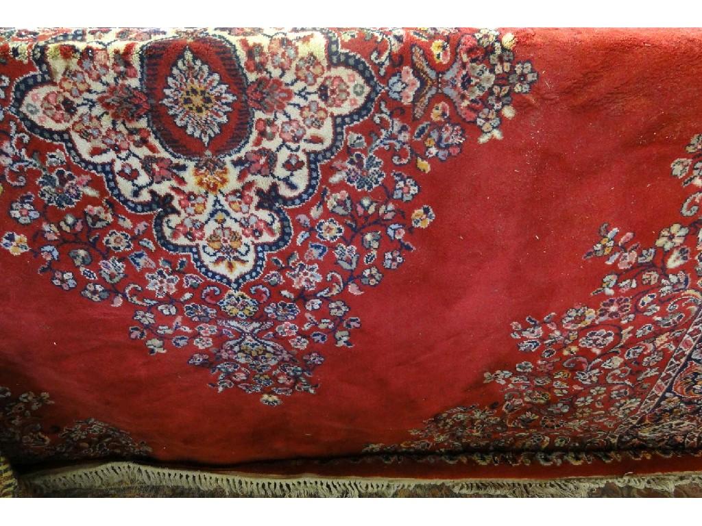 Appraisal: A large Indian design carpet with a large floral central