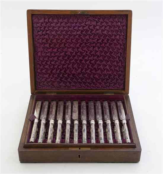 Appraisal: An English Cased Silverplate Fruit Service comprising forks and knives