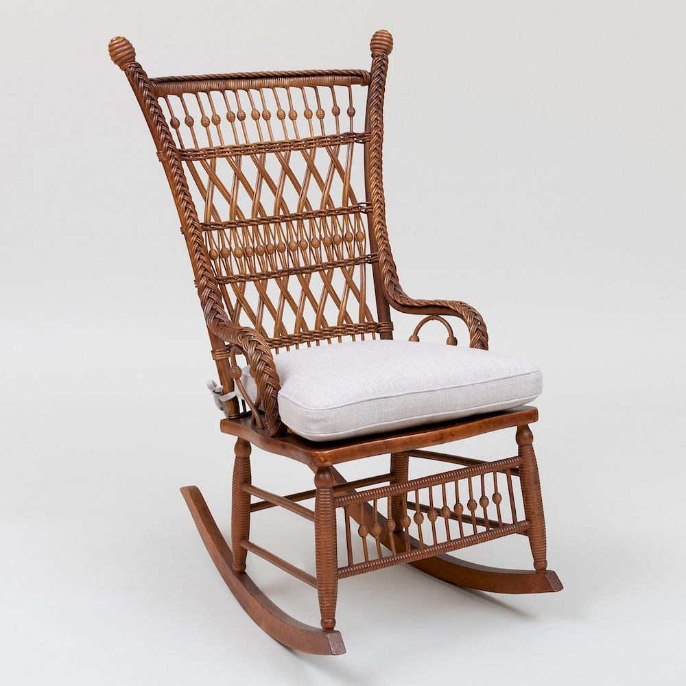 Appraisal: Victorian Wicker and Caned Rocker Heywood Bros Co With a