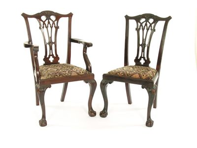 Appraisal: A set of eight mahogany Chippendale style dining chairs with