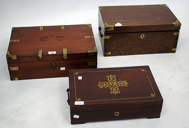 Appraisal: THREE MID TO LATE TH CENTURY TEAK CAMPAIGN STYLE BOXES