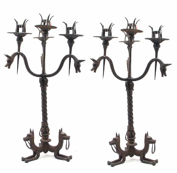 Appraisal: A pair of Italian Renaissance style bronze candelabra one repaired