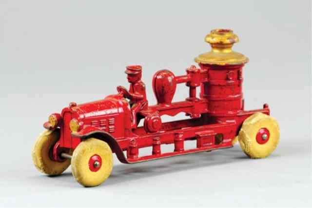 Appraisal: KENTON FIRE PUMPER Cast iron painted in red overall gold