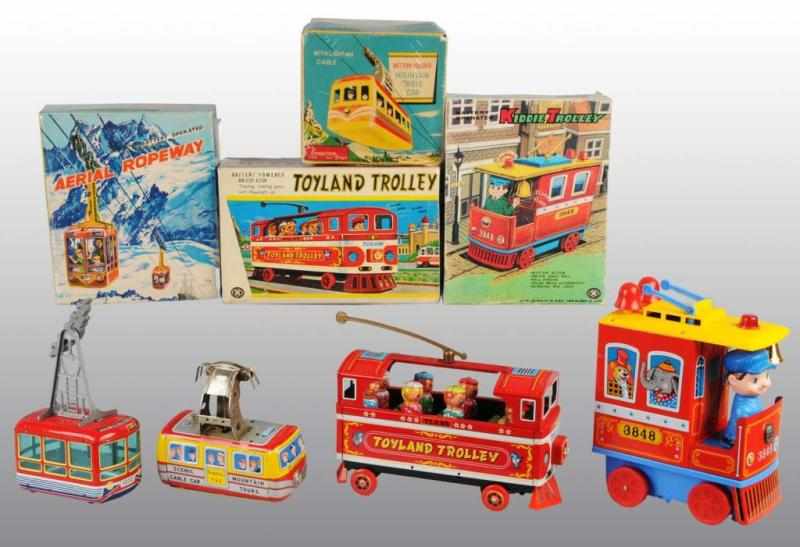 Appraisal: Lot of Tin Vehicle Battery-Operated Toys Description Japanese Working Includes