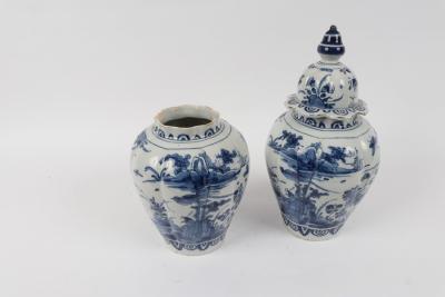 Appraisal: A pair of Dutch Delft jars one with cover each