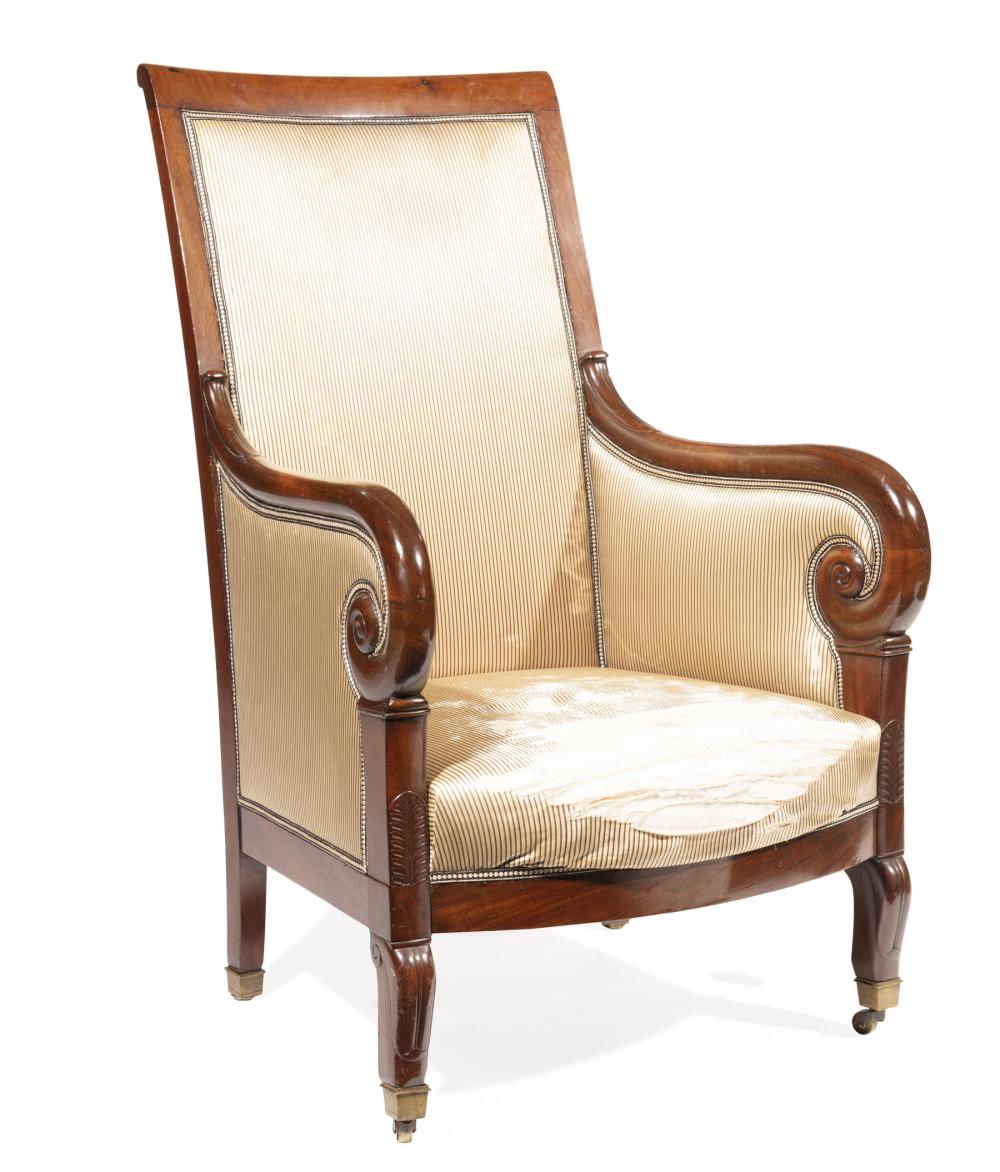 Appraisal: Louis Philippe Carved Mahogany Bergere c heavily scrolled arms foliate