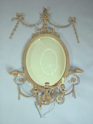 Appraisal: A gilt composition Neo-classical style triple branch girandole wall mirror