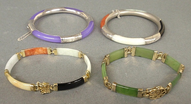 Appraisal: - Four jade bracelets with silver gold mounts each approx