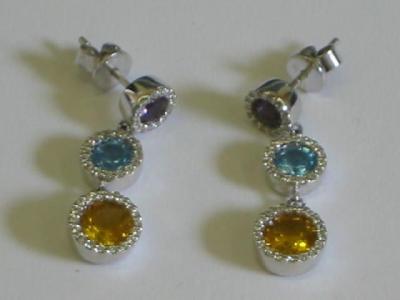 Appraisal: A PAIR OF AMETHYST TOPAZ AND CITRINE EARRINGS having three