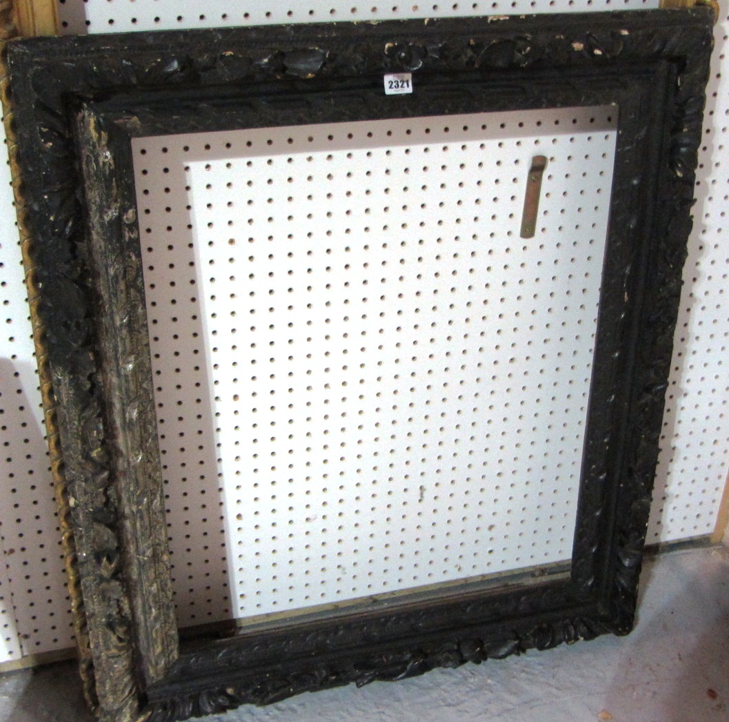 Appraisal: A black painted th century carved frame