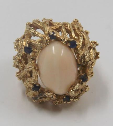 Appraisal: JEWELRY Modernist kt Gold Coral and SapphireRing Central coral cabochon