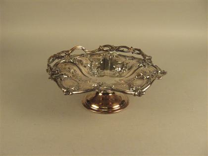 Appraisal: American silver-plated swing handle fruit basket The whole decorated with