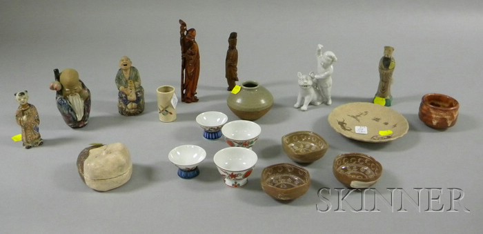 Appraisal: Group of Asian Figures and Sake Cups covered ceramic figure