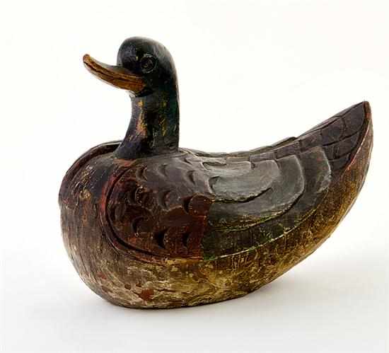 Appraisal: Polychrome carved wood duck decoy primitively carved with feather details