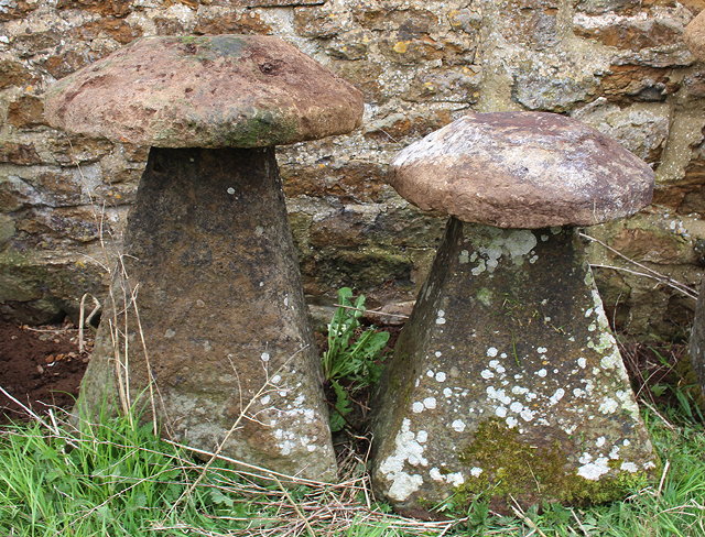 Appraisal: TWO OLD STADDLE STONES on rectangular spreading bases the largest