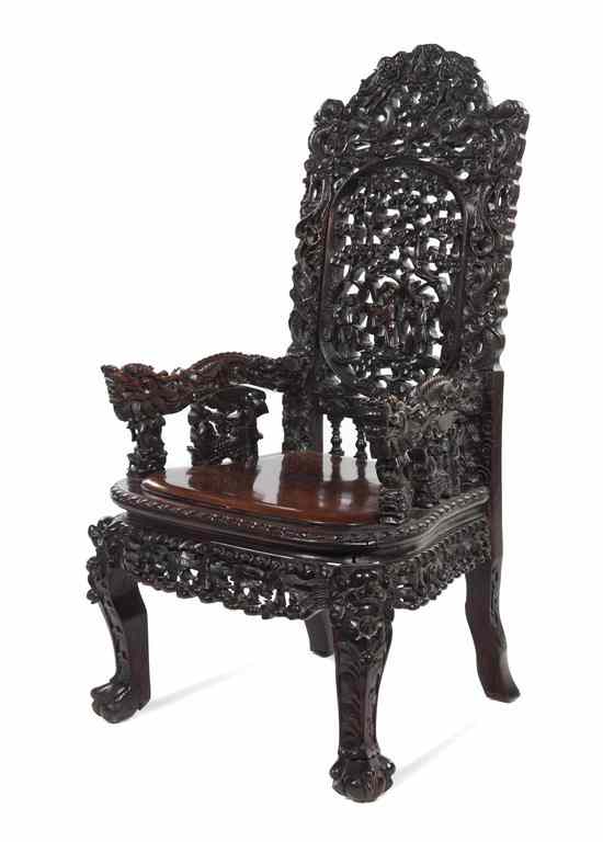 Appraisal: A Chinese Carved Hardwood Armchair th century having pierced carving