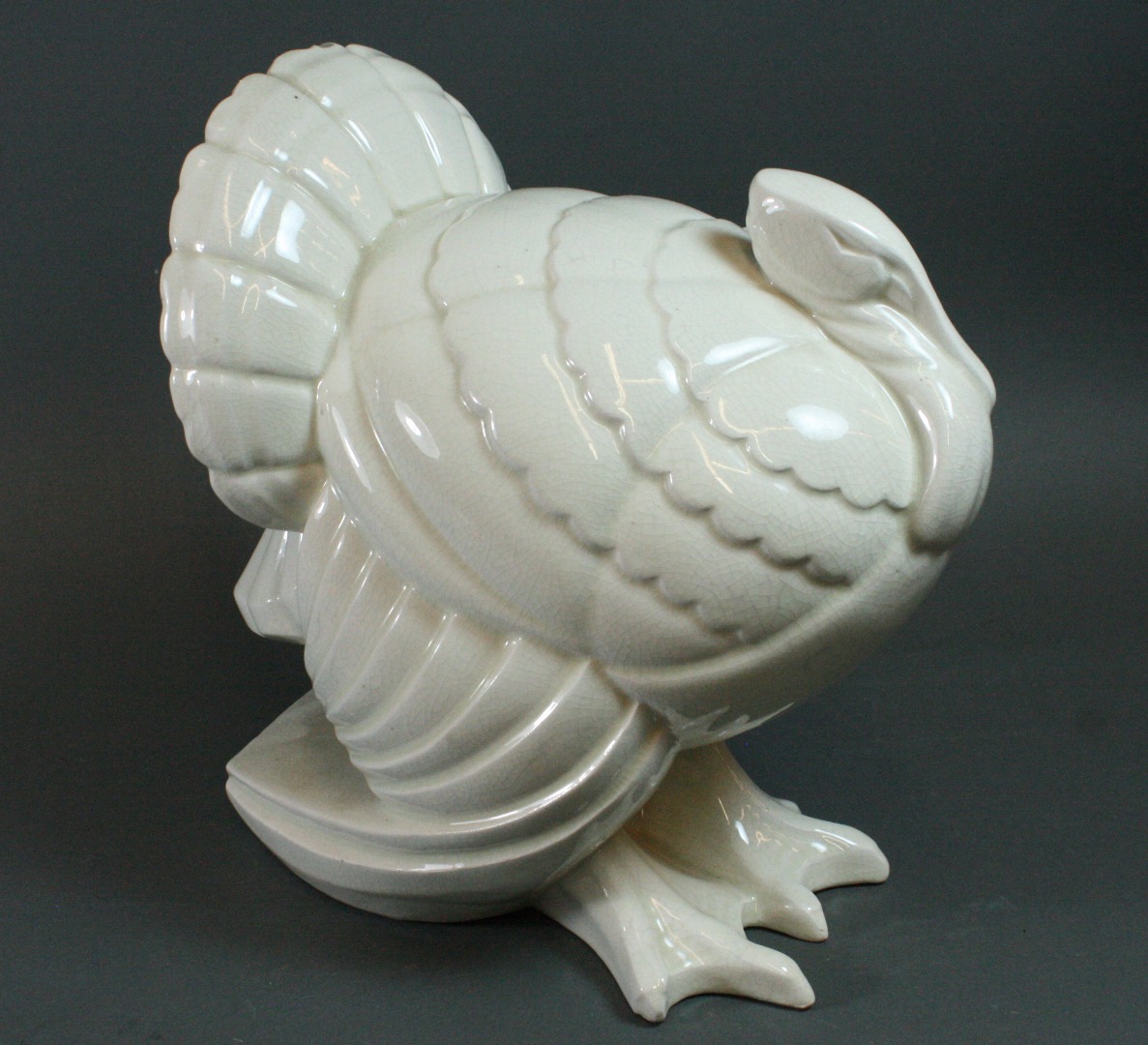 Appraisal: A French cream crackleglaze figure of a turkey first half