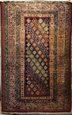 Appraisal: AN ANTIQUE CAUCASIAN SHIRVAN RUG with Chi Chi border the