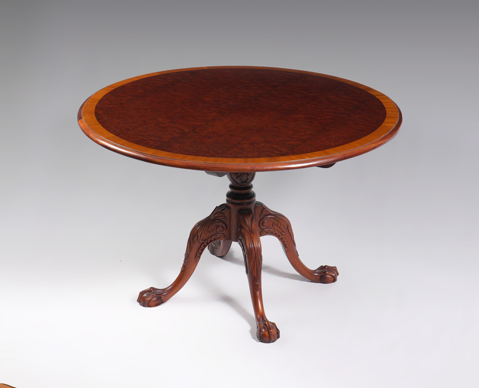 Appraisal: BANDED MAHOGANY ROUND TOP TABLE Round top with richly grained