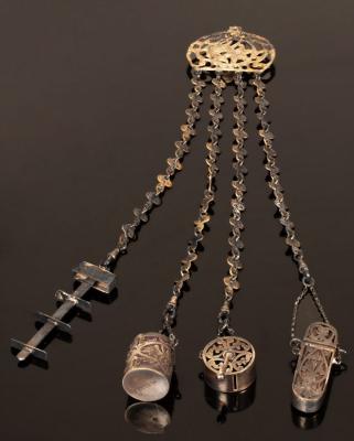 Appraisal: A trefoil-shaped chatelaine the silver links LE Birmingham with a