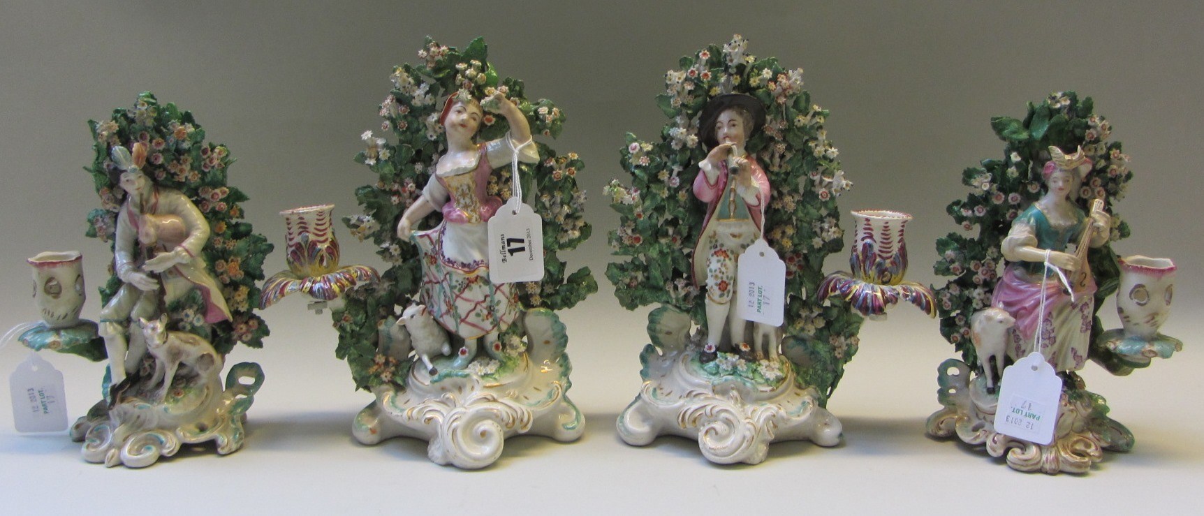 Appraisal: A pair of Derby porcelain figural candelabra late th century