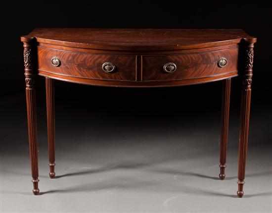 Appraisal: Potthast Brothers classical style carved mahogany bow-front serving board Baltimore