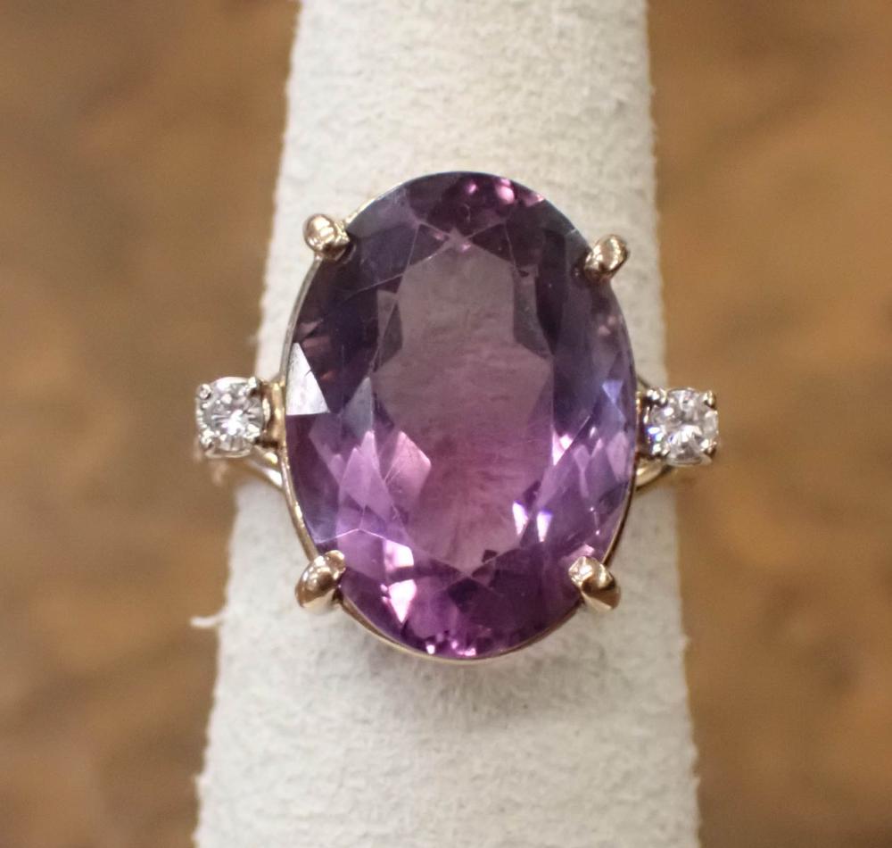 Appraisal: AMETHYST DIAMOND AND FOURTEEN KARAT GOLD RING The yellow gold