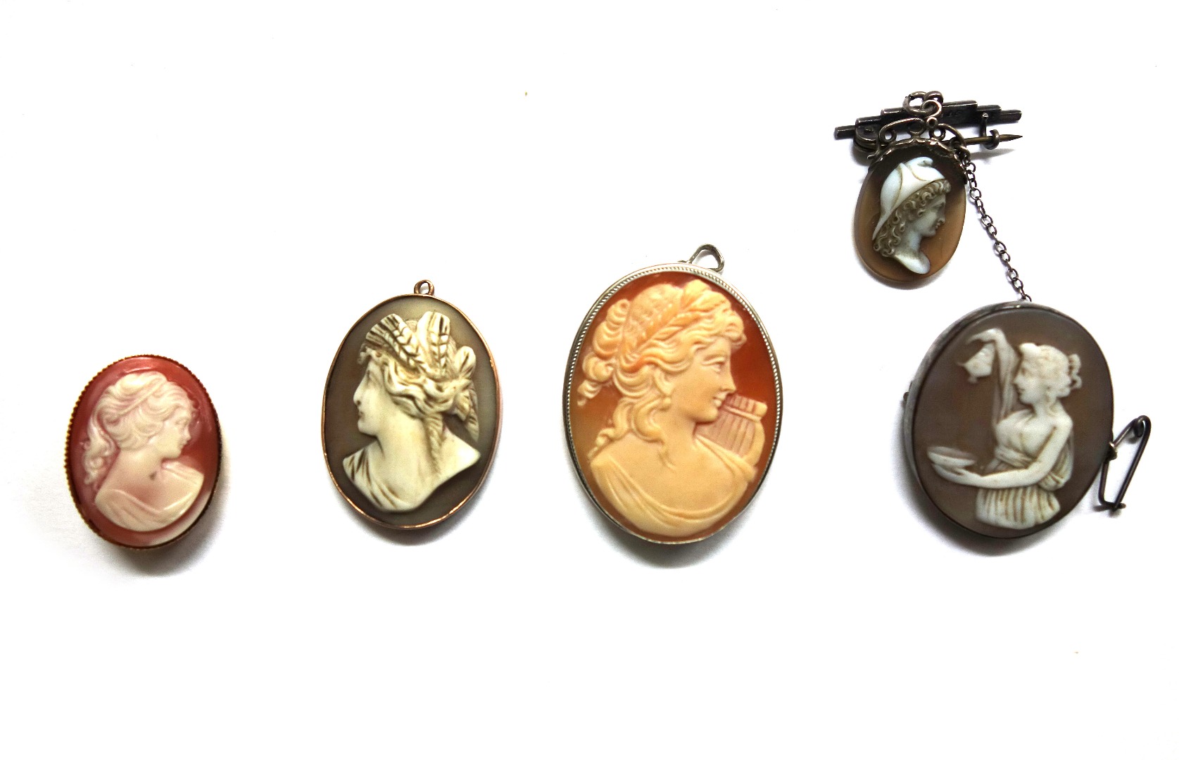 Appraisal: Five various oval cameos comprising a Victorian shell cameo depicting