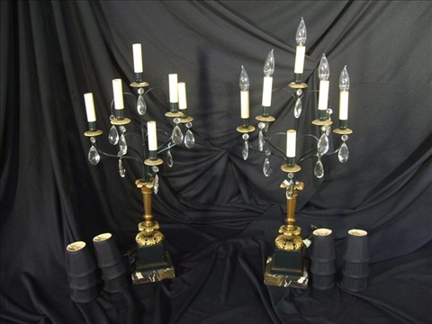 Appraisal: PAIR OF CONTINENTAL GILT-BRONZE EIGHT LIGHT CANDELABRA Cast as a