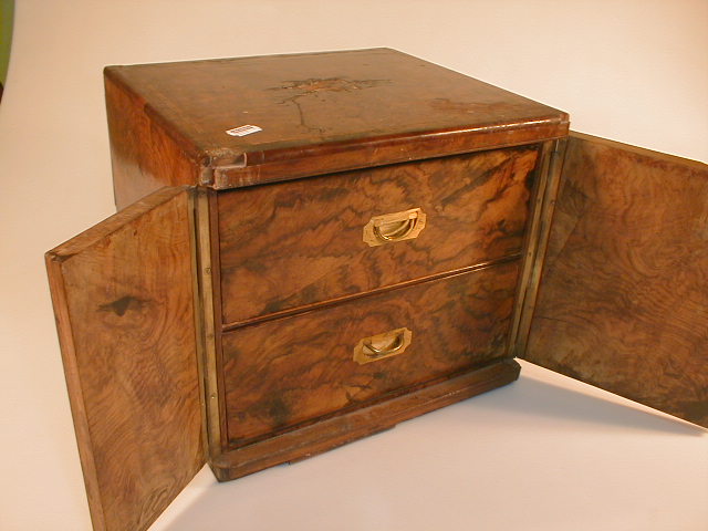 Appraisal: A Victorian burr walnut and cross banded table cabinet with