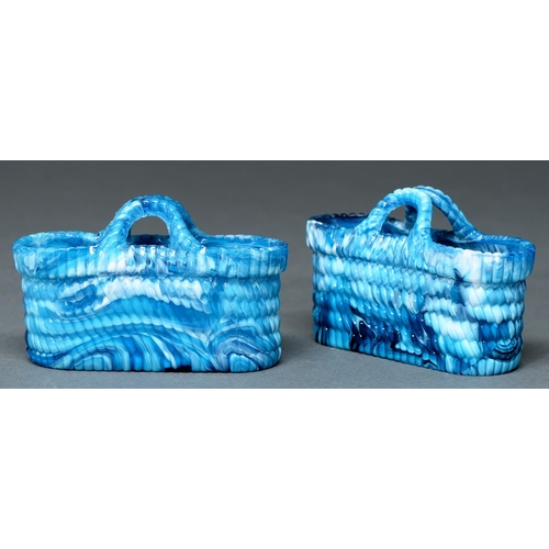 Appraisal: A pair of Sowerby press moulded 'blue malachite' glass baskets