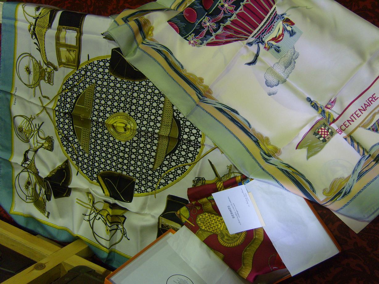 Appraisal: A boxed Hermes scarf the design incorporating drums tassels etc