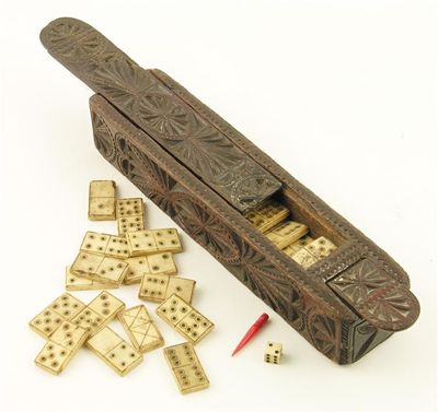 Appraisal: An oak chip carved dominoes box probably Welsh th century