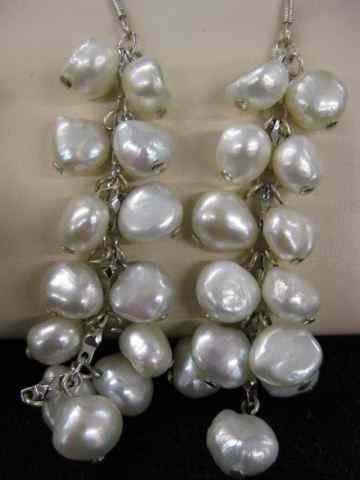 Appraisal: Pearl Earrings a fancy dangling cluster ofwhite button pearls in