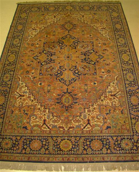 Appraisal: SMALLER KARASTAN DARK BLUE GROUND RUG Provenance ANTIQUE CONTEMPORARY LEASING