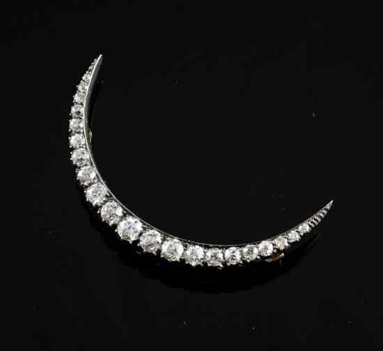 Appraisal: An Edwardian graduated diamond set gold crescent brooch ins Estimate