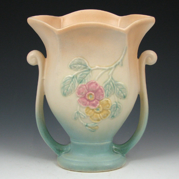 Appraisal: Hull Dogwood - Vase Dogwood handled vase in cream and