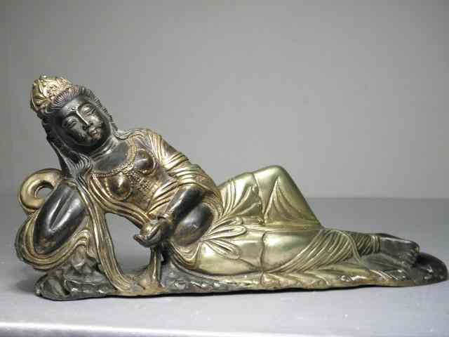 Appraisal: Bronze Buddhist sculpture of Kuan Yin reclining Gilt accents on