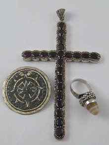 Appraisal: A large cross in white metal tests silver marked set