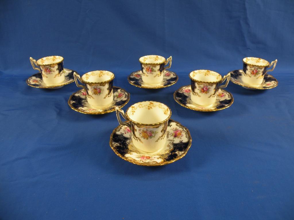 Appraisal: A Coalport Bat Wing coffee set printed and painted with