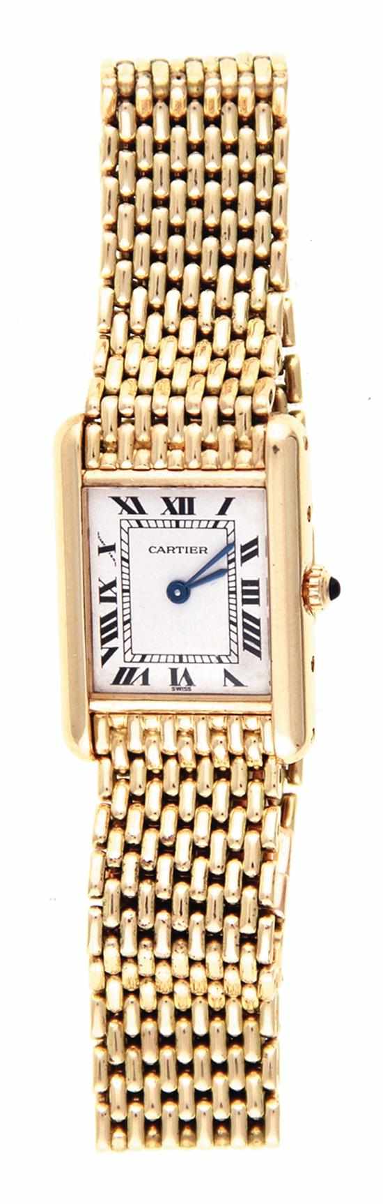 Appraisal: Cartier gold Tank lady's wristwatch quartz movement enameled dial with