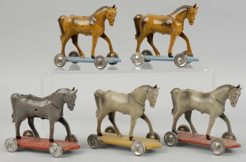 Appraisal: Lot of Tin Nickel Size Horse on Platform Toys Description