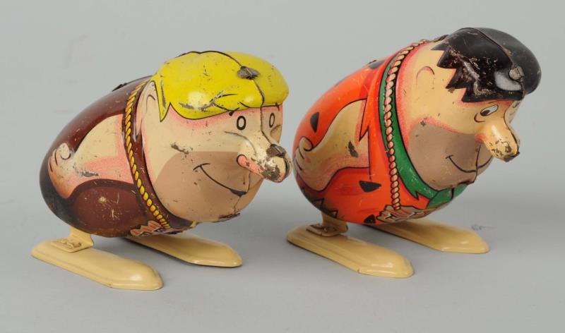 Appraisal: Lot Of Marx Flintstones Wind-Up Hopper Toys Both have moderate