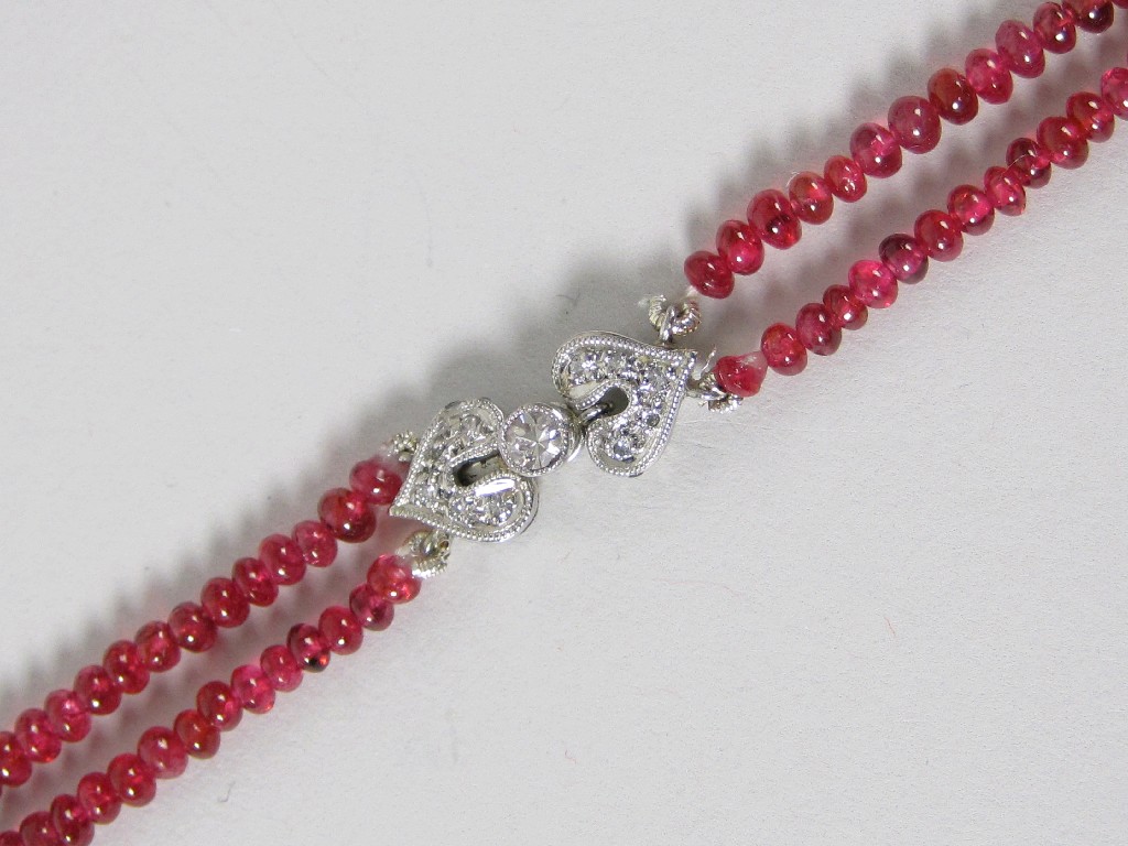 Appraisal: A double row Red Spinel Bead Necklace with diamond clasp