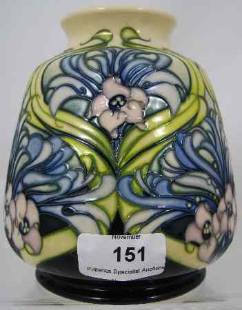 Appraisal: Moorcroft Trial vase decorated in blue and green Florian design